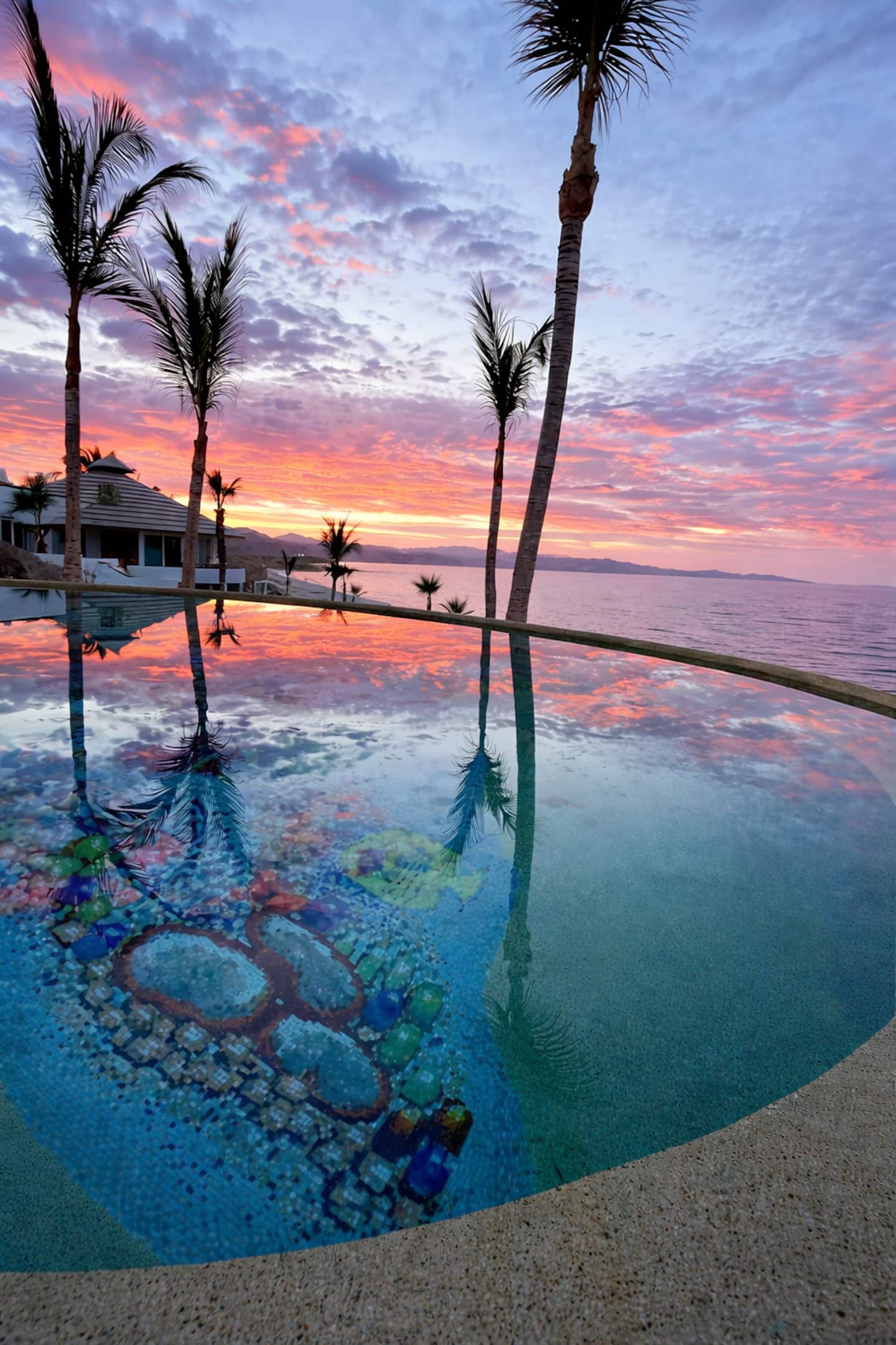 Calm beachfront water in front of a Baja beach house