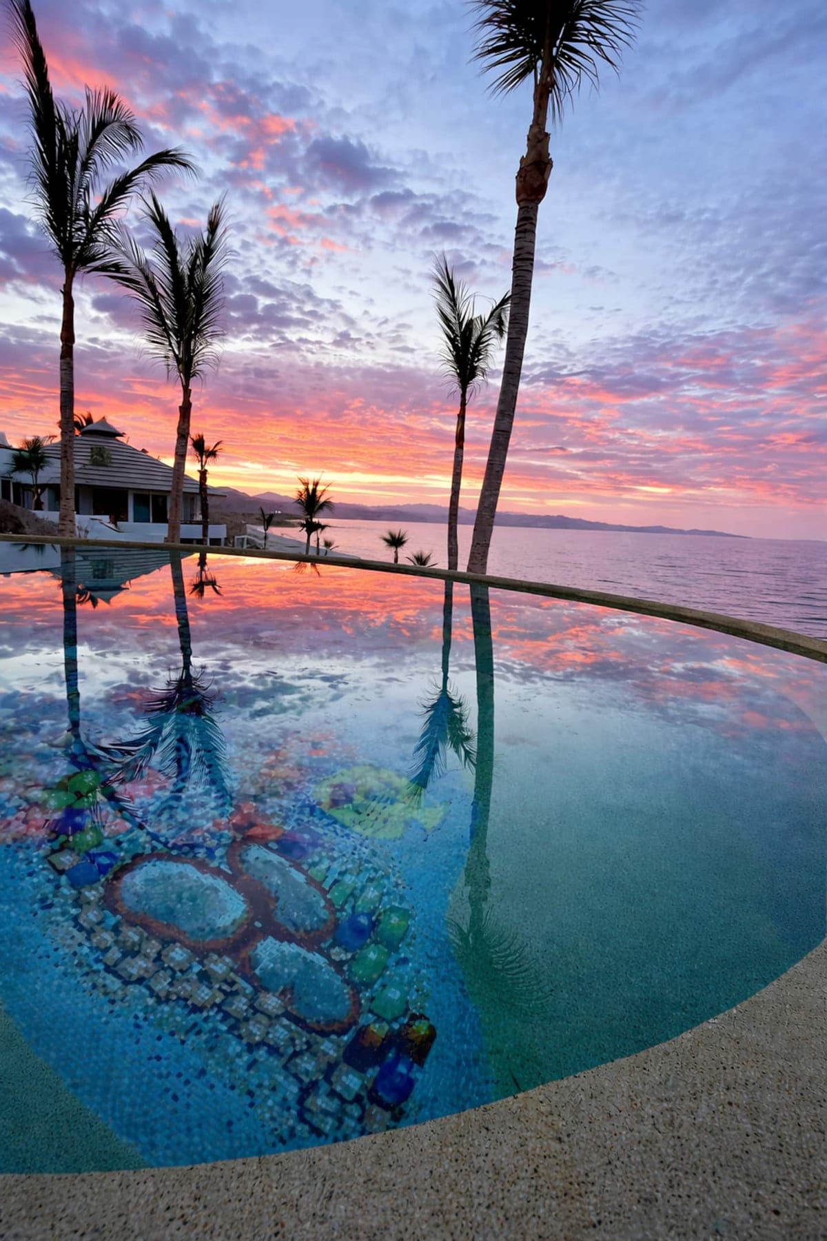 Infinity pool at sunset over the Sea of Cortez