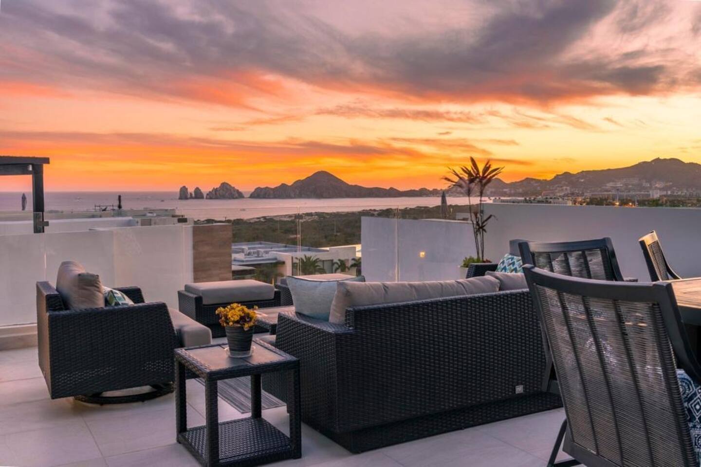 A bright villa interior opening onto a terrace
